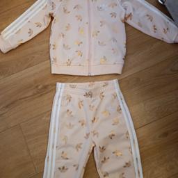 pink and gold Adidas tracksuit. New condition age 2-3