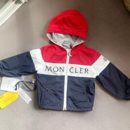 Baby boys Blue & Red Moncler jacket.  In really good condition, only been worn twice. Have the original tags. Size 18/24 months

Will post out 1st class recorded via Royal Mail