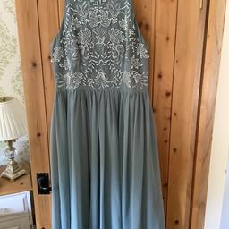 Size 12 with beautiful pearl detailing to bodice