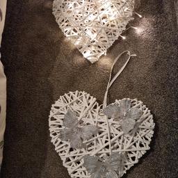 2 lovely white decor hearts one with lights and one with sparkle butterflies will look lovely anywhere in the home £5 for both pick up only hindley wn2