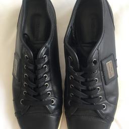 Used black Dolic and Gabbana leather shoes  size 6.5