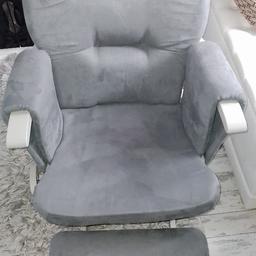 exceptional condition
no marks or damage, like new
soft grey suede effect rocking chair with
matching rocking footstool
reclines back by lifting arms up and moving backwards, from slight to full recline
pockets on both arms
bought from large designer baby shop 
collection Atherton
from a very clean, pet and smoke free home