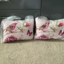 These pillows ( which show a pink bird sitting on a twig with a butterfly) a small pillows, perfect for decorations or armchairs. No delivery, collection only.