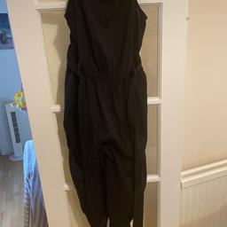 Black jumpsuit (with belt)
Excellent condition (with tag pictured)
Never worn
Cash and collection only