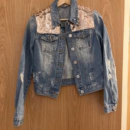 Blue with gold sequences Mrs Selfridge jean jacket, size 8, ideal for parties and other social occasions.excellent condition. Teenage girls could wear it too.