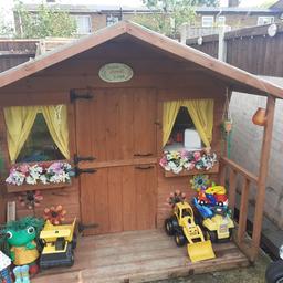 Wendy house approximately 8ft x 6ft complete with furniture and kitchen toys buyer to collect