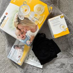 Medela electric double breast 
Comes with extras 2x bras, storage bags, storage bottles, breast pads and more