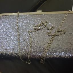 here we have an evening bag in good condition from oasis, sort of lilac colour, with chain type handle, collection only from Shirley Croydon £8
