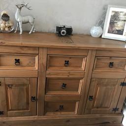 We are selling our sidetable. It's solid wood. Natural finish. With black hardware. It's In very doo overall condition. With lots of starage. Only 1 bit of damage in top corner (see pic) will lit into most cars if back seats are folded down. Soild wood. Size 1320 widw x 840 high x 440 deep. Cash on collection only. Can deliver if in local area once received payment.