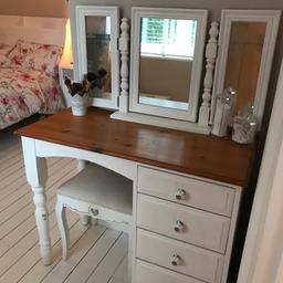 Selling my wife's dressing table. Painted white with natural wood top. 4 draws on right side. And decorative legs. Sold with the folding mirror. Does have some paint missing where stool has rubbed it off. And prob small marks on it but overall good condition. Collection only not including stool. Stool sold separately. Size 989 wide x 775 high plus mirror on top x 450 deep. Cash on collection only please. 