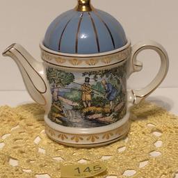 Sporting scene tea pot in excellent condition
