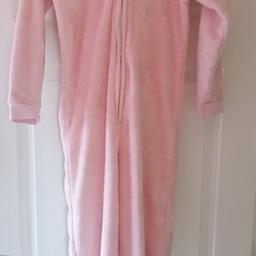 Soft pink unicorn hooded girls onesie with zip. Very good condition. Size 8-9 y. From a smoke and pet free home.