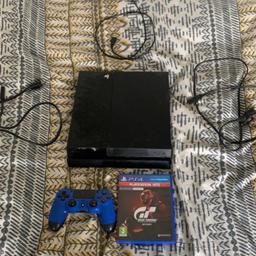PS4 comes with a blue controller 
It is 1TB
HDMI cable 
Charger for the controller
And the other cable 
Also come with a Gran Turismo game