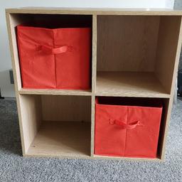4 cube storage unit. Light oak effect colour. Used with slight wear. Boxes can be changed to your own colour. Light wear as seen in pics. May be ideal for children's bedroom.

Collection from Bilston wv14
