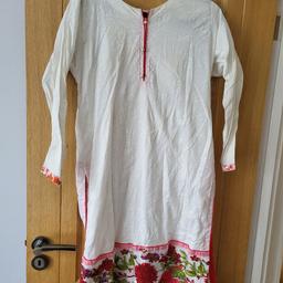 In excellent condition white ladies dress with trousers. 
size xl 
pick up only 
£10 ono