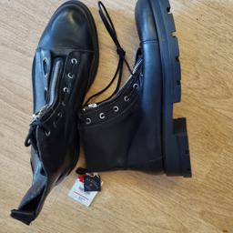 Genuine leather boots with zip and laces