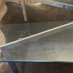 Glass table with chrome legs. 2 available. Good quality toughened glass.