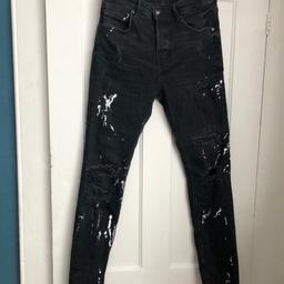 In excellent condition.
Design has white paint splashes and 4 large rips - 3 of them have denim material behind so can’t see skin.

Slim fit.

Collection from Hither Green SE13