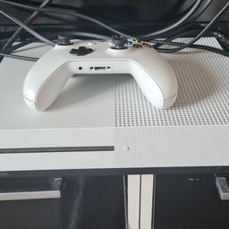 Xbox one s, comes with 5 games and all leads . Controller available but does have controller drift. No box, only selling due to upgrade.