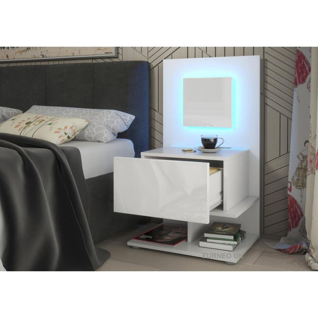(Blue LED Lights) White Bedside Table Cabinet Nightstand With Drawer & Shelf Gloss & 16 With LED Lights
Drawer door and the illuminated panel in high gloss white, body (top, sides and inside) in matt white
Bedside cabined includes a drawer and lower shelving
Unit dimensions (WxHxD): 50x90x38cm
Available with additional LED lights, where purchased, a set including 75cm LED strip + UK Power adapter will be included
Supplied flatpacked, self-assembly required, picture instructions included