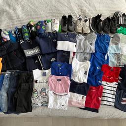 Boys bundle of clothes. Age 7-8 years old.  Very good condition. Includes:

Adidas, Nike, McKenzie & River Island tracksuits.
River Island, Moncler, Nike short sets.
Ralph Lauren body warmer.
Tommy Hilfigier, Abercrombie, River Island, Lacoste, Champion T-shirts.
Ralph Lauren polo tops.
Short & long pjs.
US polo swim shorts.
Next, River Island shorts.
Zara tracksuit trousers.
X3 Nike trainers (white & black trainers not so in good condition).
Zara black boots.
Sliders.

Buyer to collect from Bexley.