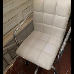 Nice cream bedroom or desk chair in superb condition adjust up and down and swivels