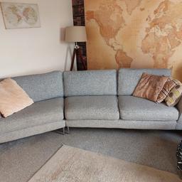 This is a Grey sofa with a silver cotton running through in good condition sturdy frame ,all zips in tact on seat cushions chair has slight dip but sofa is ok ,legs could do with attention, smoke free home but needs a clean ,would put someone on or for a while all reflects price. collection only sofa splits in 2. no offers