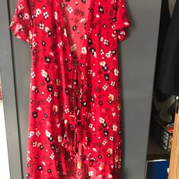 This dress is an open dress and is size 12-14. If you like there is a box with 40  dresses and you can buy it all from us. £5 each. No delivery, collection only.