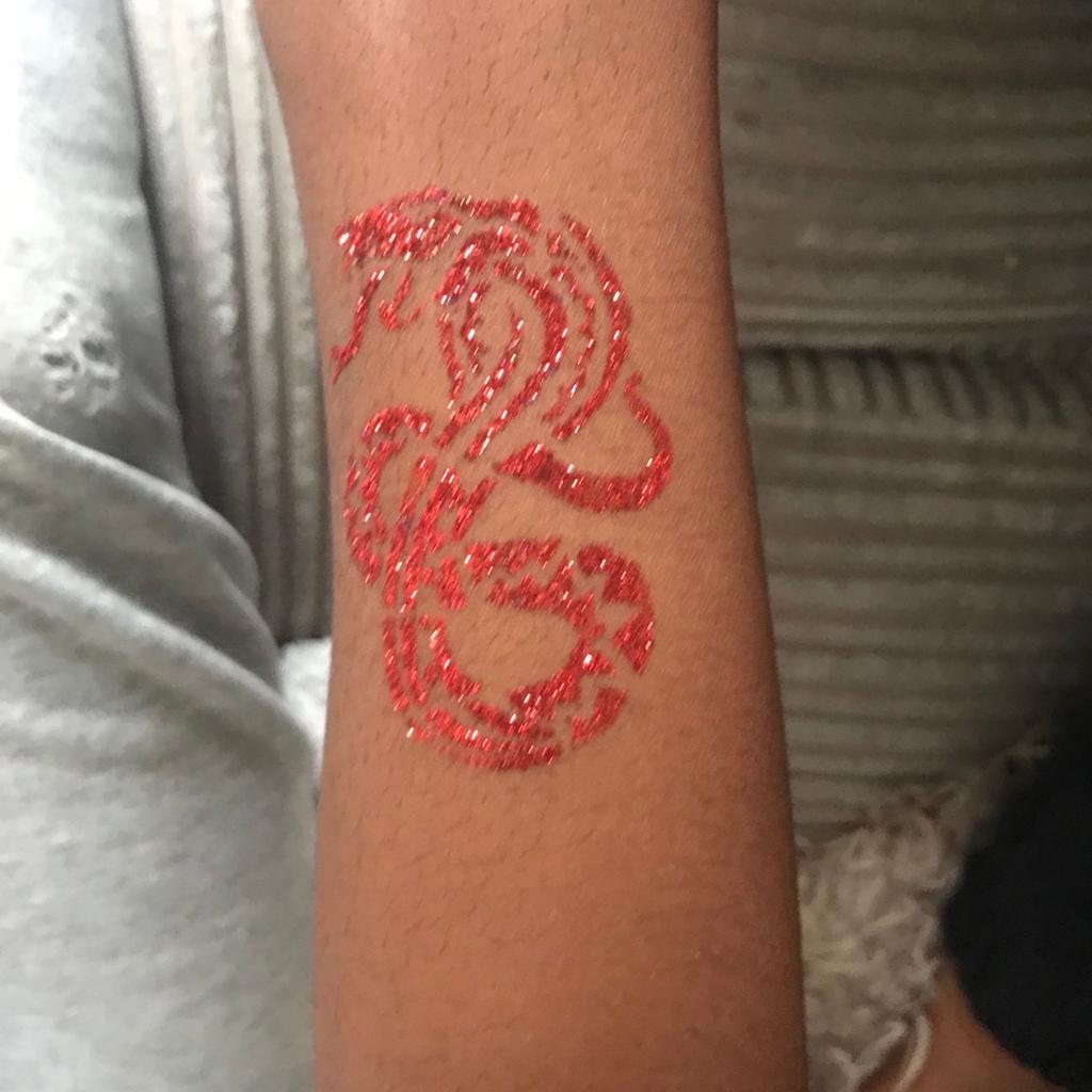 Friendly and reliable glitter tattoo artist for parties and events, please feel free to message for a quote . Based in Wolverhampton .
