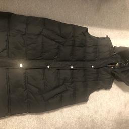 Black has a hood zips to the bottom sides 
Worn a couple times 
Excellent condition 
Size 16 
Pick up only