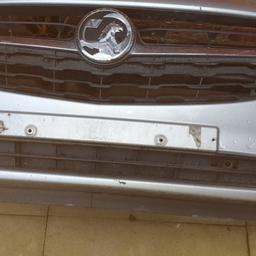 vauxhall corse bumper with grille with right side foglight.
driver side is damaged