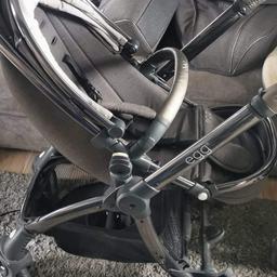 Grey pewter egg pram mothercare exclusive
Comes with bag (had zip replaced)
raincover (rip as shown in photo)
Pram liner and newborn insert (used for a month and half) 
Has recently had new basket
Scratches  from getting in and out in of car and general use 

£100 ono