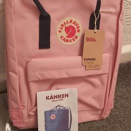 brand new backpack pink with black straps.  original.