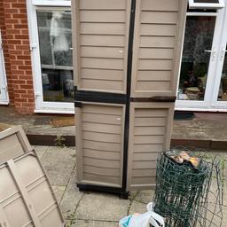 Garden storage cupboard 
Tall
Kept it in the back garden 
Water resistant 
Covered with tape to keep waterproof 
Can be used in the garage 
Fair condition 
2 shelves
You can see in the picture the condition of the cupboard 
Collection only