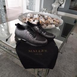 genuine mallets like new first to see will buy. Black and grey size 42-43  dust bag included