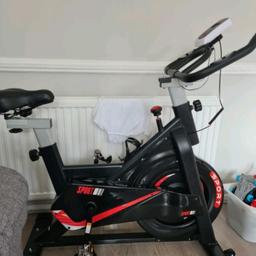 Pristine condition Unisex exercise bike. Features: adjustable seat and handle bars. Push stop button, bottle holder, monitor for heart rate, calories, time, odo, distance, pedals are strapped to avoid slips.