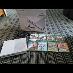 xbox one 500gb in white with grey controller
boxed with hdmi and power cable and games
used but in immaculate condition from a  non smoking home
selling due to upgrading both my sons so they can play cross platform fifa23
not interested in insulting offers from timewasters
sold as seen
cash on collection