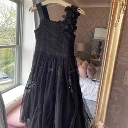 Beautiful dress made from net. Very classy and in very good condition