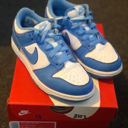 Nike dunk low 
University blue 
Uk 13 children
US 13.5 
Boxed 
Excellent condition had hardly any ware as son had outgrown. 
Very sought after trainer 
Item will be tracked in postage