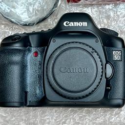 ~ Canon EOS 5D full frame digital SLR camera with two lens from Sigma. (Wide angle and Macro).

~ Box with cables, battery, charger & Manual

~ Strap