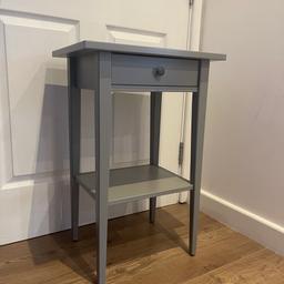 Hemnes ikea bedside table. Good condition only has little crack on the top. 
Grey color