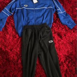 brand new unused in packaging mens hummel size uk L tracksuit 2pc. immaculate condition rrp89.99 gr8 savings gr8 self buy or gift idea. see my other items for sale too. thanks for looking.
