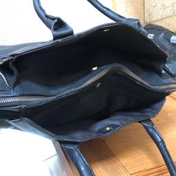 NEW with tags super quality black leather handbag by NEXT. Measurements are 10.5”deep 20” across 7” wide base. Would make a lovely gift RRP on tag is £80, can deliver if local.