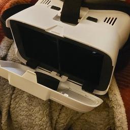 mobile phone VR headsetfor sale. No electronics needed just download the VR app on your phone and pick a game put it in the phone slot and of you go i had the rollercoaster but not my type of gaming... £10 or nearest offer collection maltby. thanks for reading (ASLO ON CARROT SALE SITE)