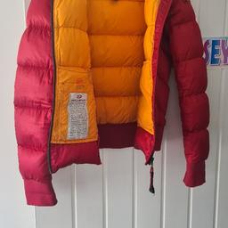 girls YL red parajumper, great condition, lovely warm coat for the winter, only selling as my daughter has new one. collect or delivery. only people who are interested, had a few time wasters