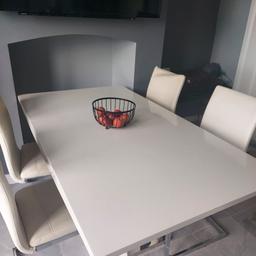 Dining table and 4 chairs not bad condition has a damaged chair as in pictures shown table has a few signs of wear selling due to buying new table. buyer to collect from bb9
