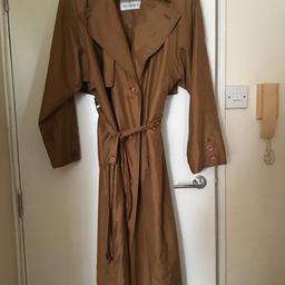 Long brown stylish vintage coat, with all original buttons and belt. Four Seasons.
Looking for a new home. Sorry no offers
