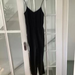 A great black jumpsuit for the party season in perfect order. Can collect or send