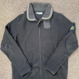 Original stone island sports wear zip up. Good condition, only worn a few times. Great casual wear with removable stone island badge on left arm.