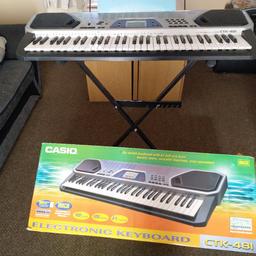 Casio electronic keyboard with stand and box selling as not getting used works as it should